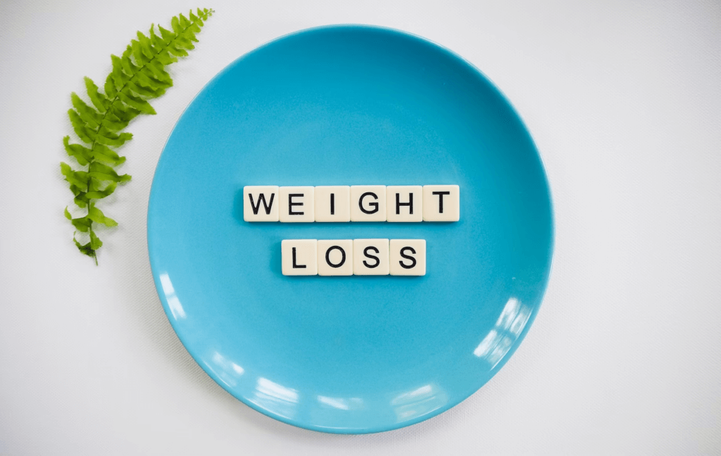 blue plate with the words weight loss