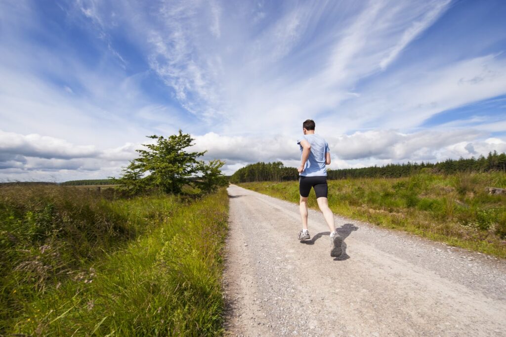 Man running on road