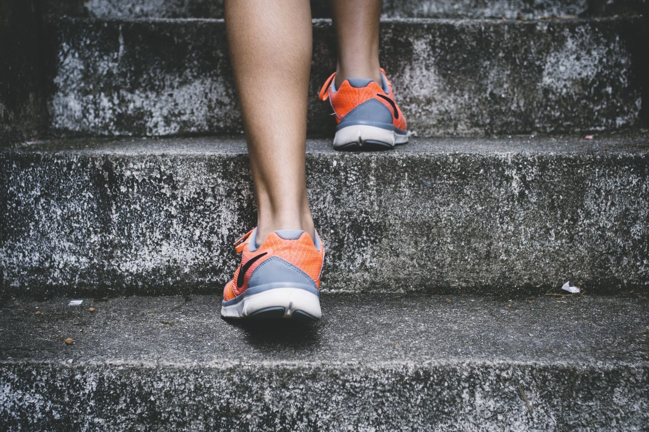 Person on a walk wearing running shoes