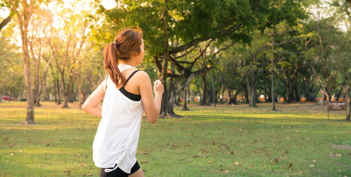 Woman Running in Park